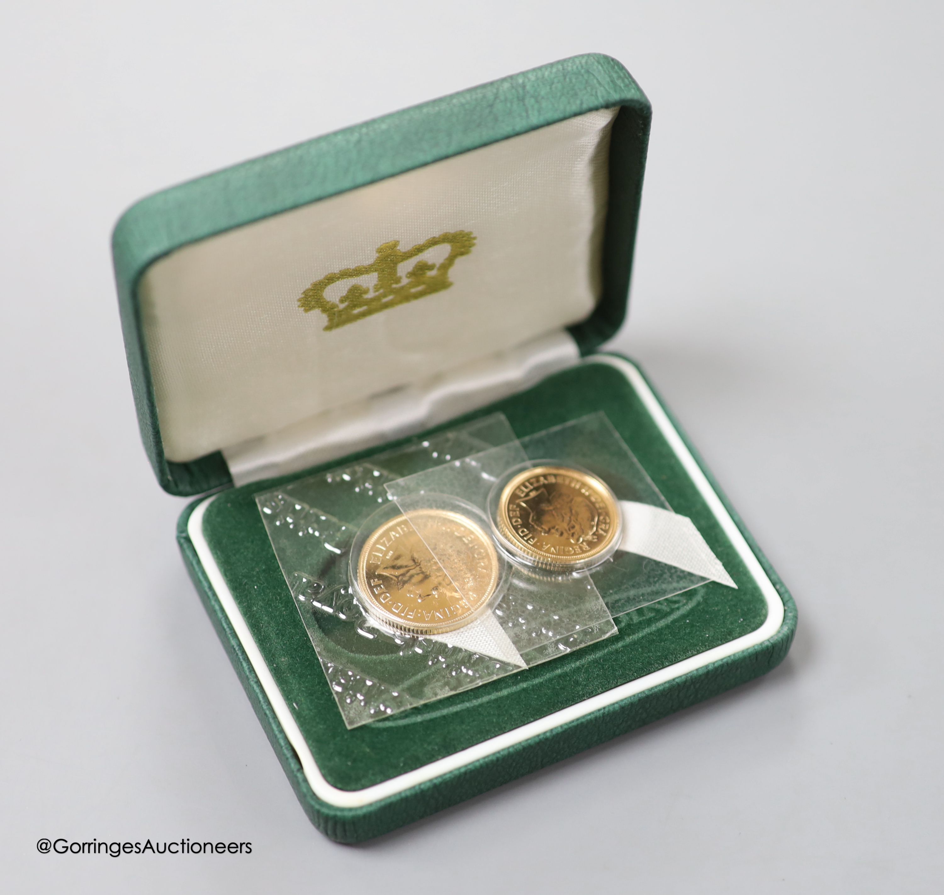 A QEII gold sovereign and half sovereign, 2006.